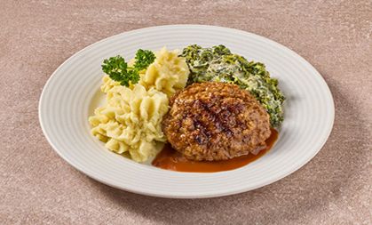 Hollandse gehaktbal in jus met romige andijvie en aardappelpuree