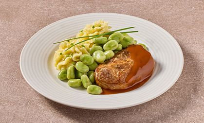 Hamlapje met tuinboontjes en aardappelpuree met bieslook