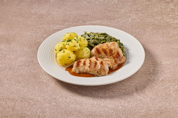 Varkenshaas met romige spinazie en gekookte krieltjes