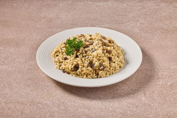 Romige Italiaanse risotto met bospaddenstoelen